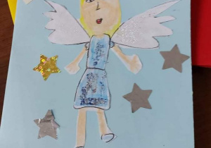 kartka świąteczna- anioł w gwiazdach
